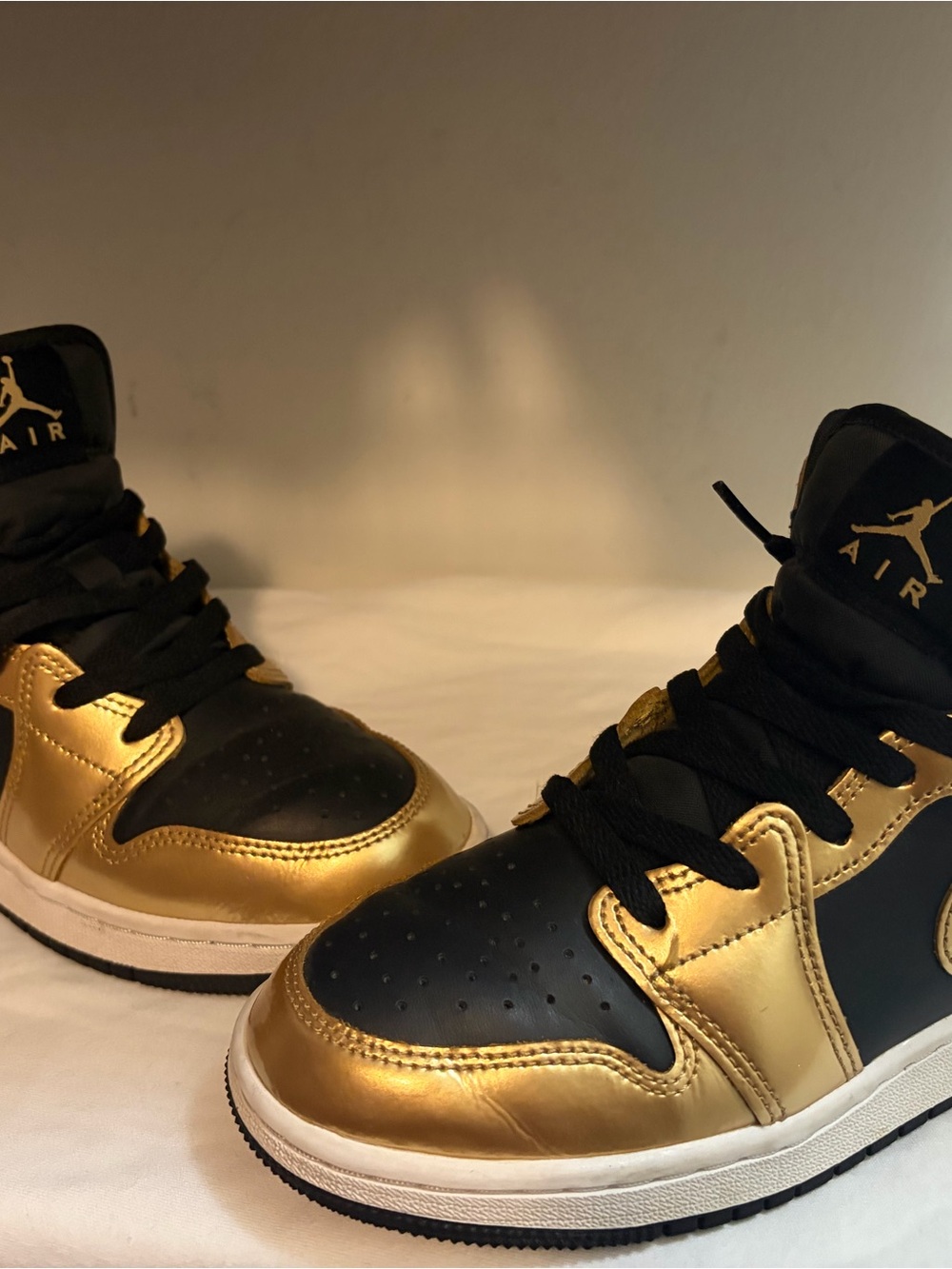Nike Kids High-Top Sneakers in Black and Metallic Gold